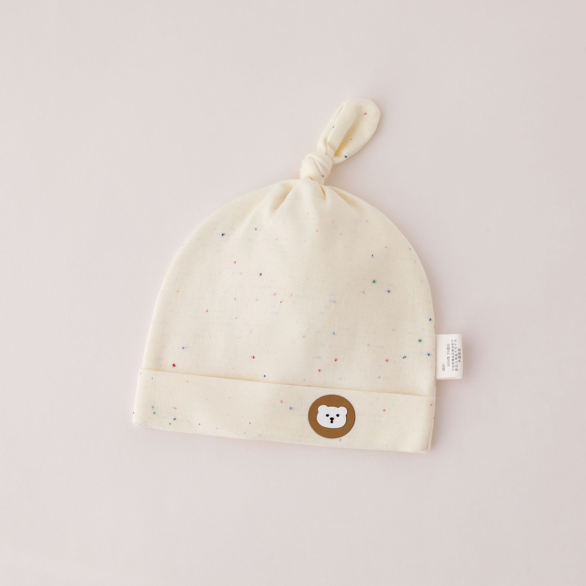 Coffee bear pulls off his hat