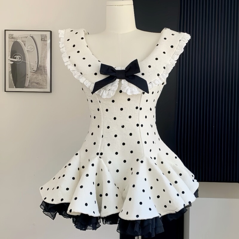 Beautiful Summer Mini Dress with Polka Dots and Small Flutter Sleeves, Featuring a Lace Bow Waist Design Beautiful Summer Mini Dress with Polka Dots and Small Flutter Sleeves, Featuring a Lace Bow Waist Design