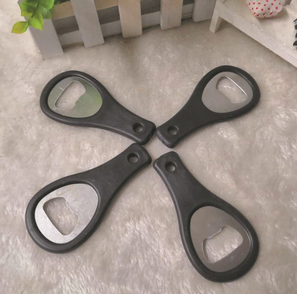 Tennis bottle opener