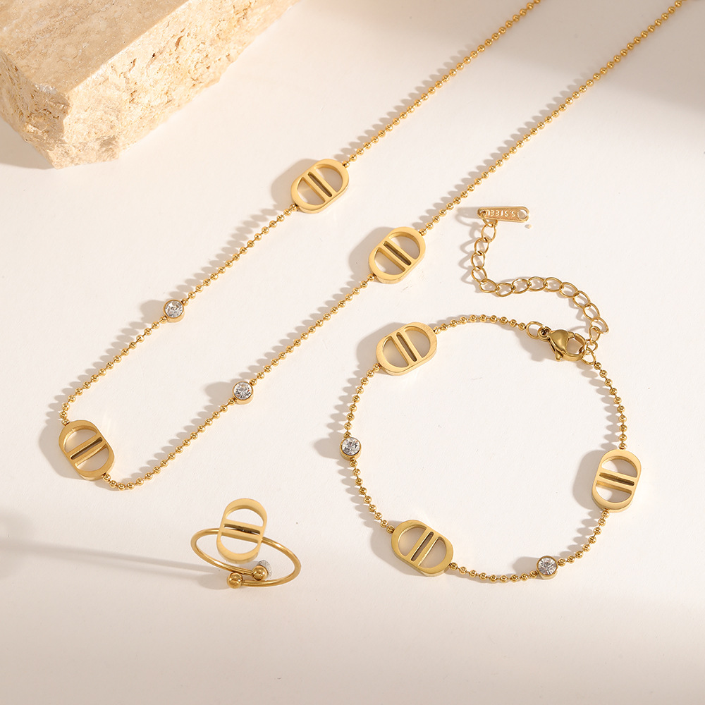 Cross-border e-commerce exclusive: a set of lightweight luxury jewelry featuring diamond-encrusted letter CD bracelets, necklaces, and earrings for women, made of double D stainless steel