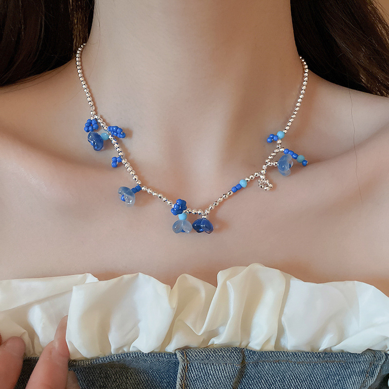 Collar con colgante de cuentas de estrella de color de verano, dulce femenino, pequeña cadena de clavícula fresca, estilo de vacaciones, collar de todo fósforo de nicho