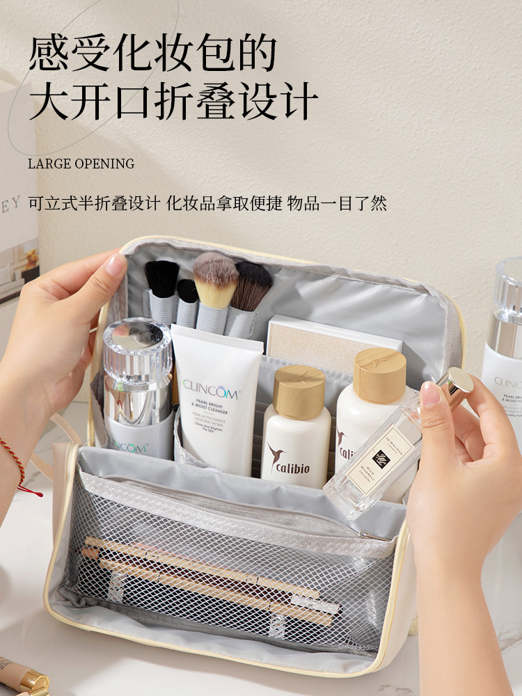 2025年新型PU化粧ポーチ 大容量 ハンドバッグ型 持ち運び便利 旅行必需品 分割式ペンケース 洗面用具入れ