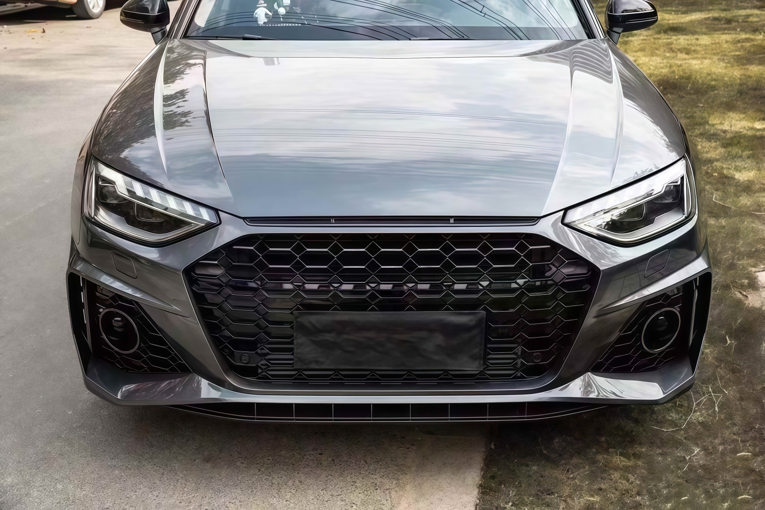 20-22 models suitable for Audi A4L, modified with an RS4-style front bumper, front grille, and front fascia