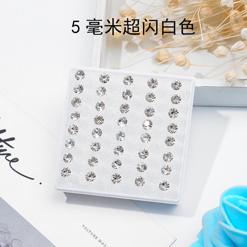 Pendientes de oreja pendientes femeninos traje puesto joyería oído hueso uñas al por mayor resina plástica redonda combinación anti-alergia