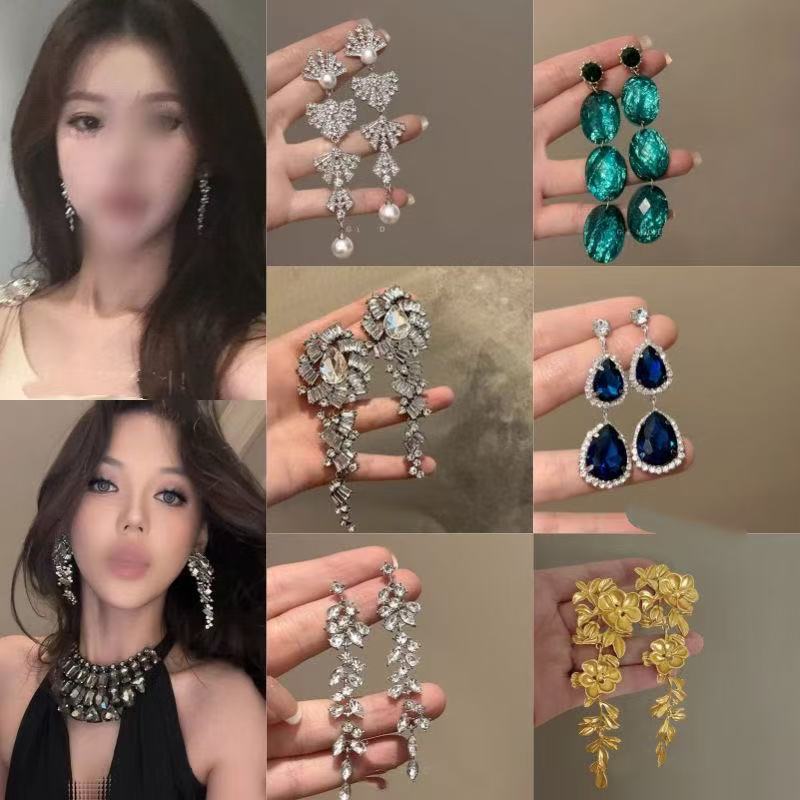 Pendientes largos de borla de circón súper flash Pendientes de lujo ligero de alta gama de moda Pendientes de todo fósforo de temperamento de nicho al por mayor femenino