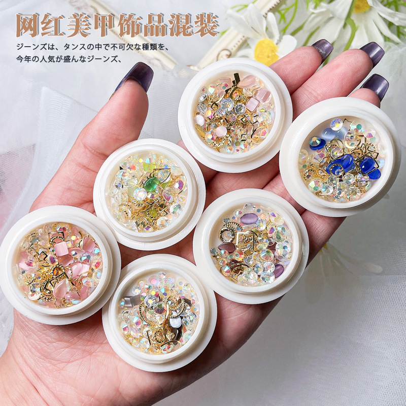 Joyería de uñas al por mayor de resina de ópalo de bricolaje remache de aleación de diamantes de imitación plana mixta Joyería de diamantes de uñas en forma especial