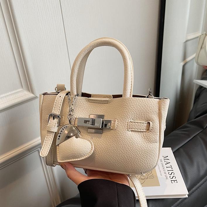 Alto sentido de lichi estampado bolso de mano Kelly2025 nuevo comercio exterior super caliente viaje bolsa de cubo de agua de moda bolsa de mochila versátil