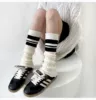 White bottom black lever socks