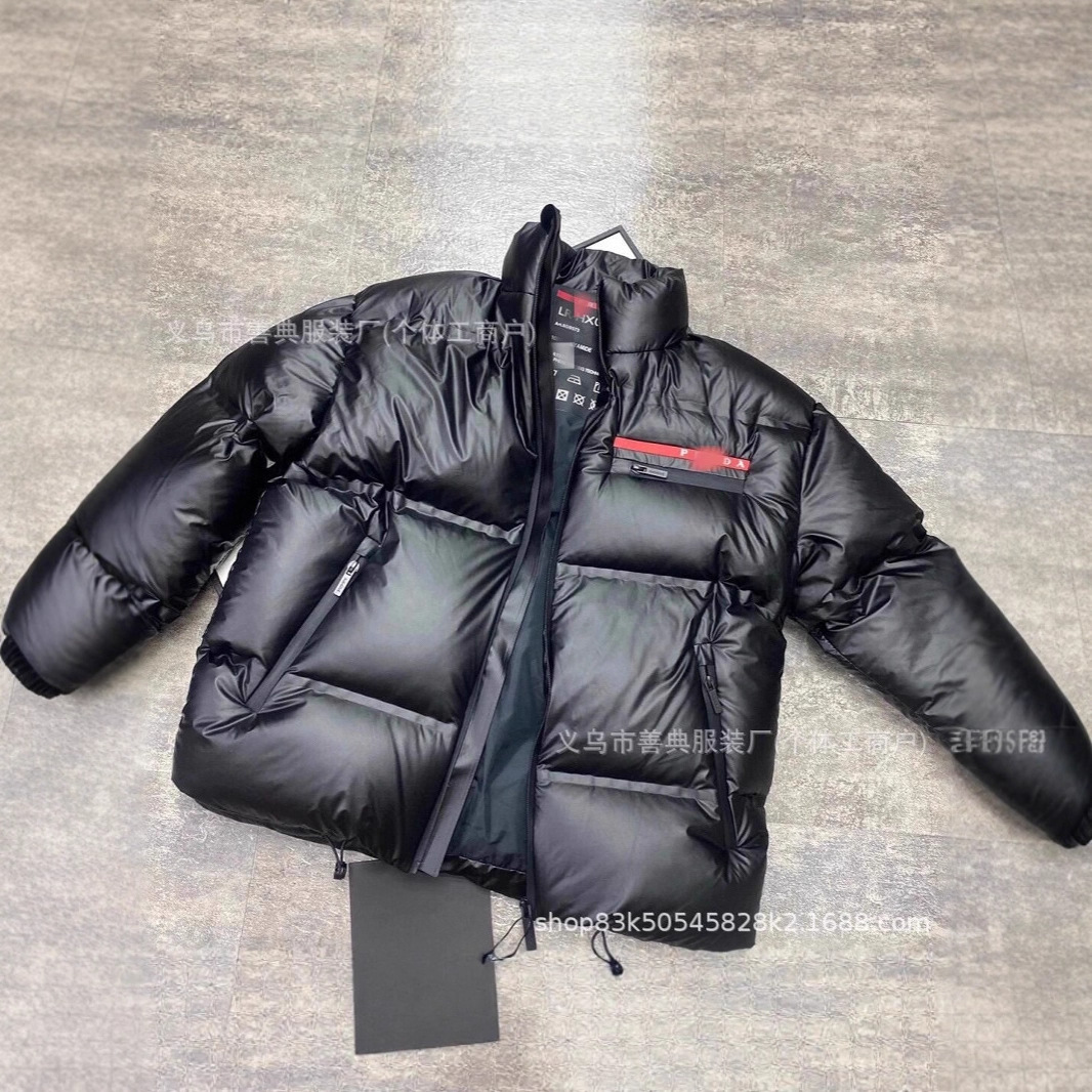 PD Pujia estación europea pareja de invierno con bolsillo de etiqueta roja chaqueta de plumón chaqueta de moda para hombres y mujeres