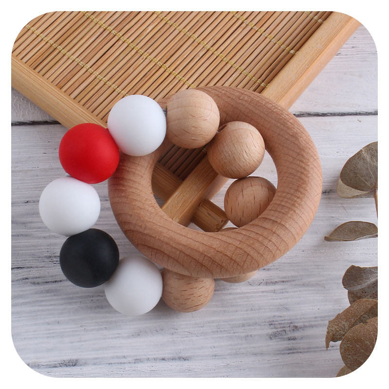 Nueva DIY creativo Beech anillo macaron color juguete teether bebé cuentas de silicona pulsera teether palo