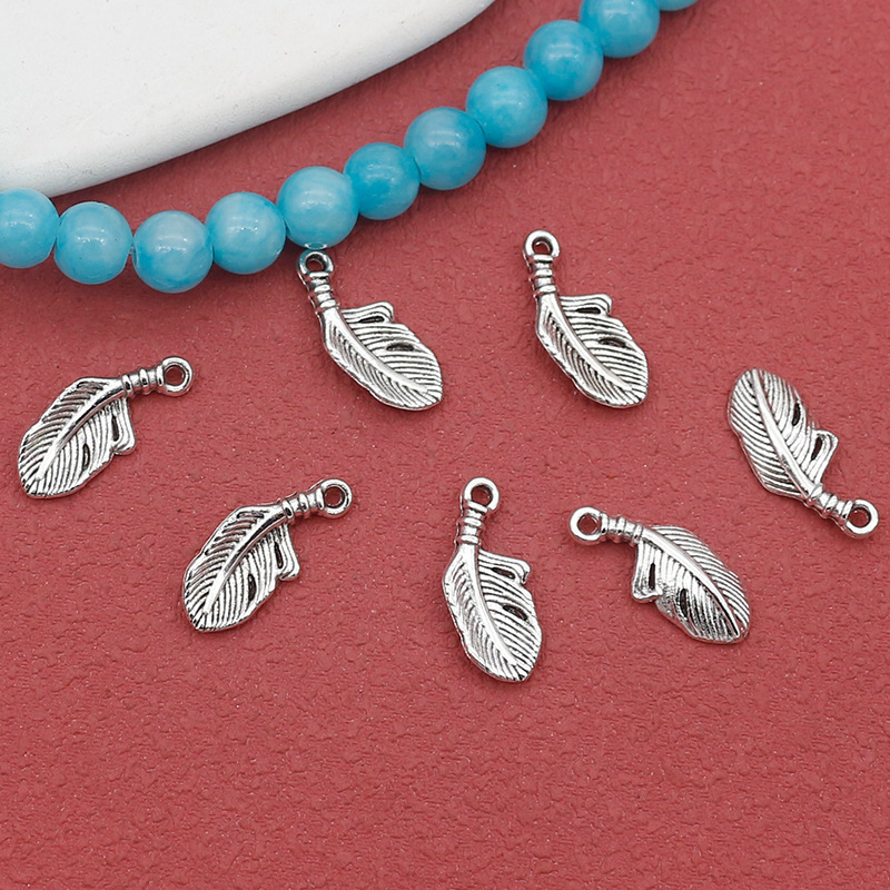 All-match jewelry Xizang silver feather small pendant bead string lanyard earrings hair accessories pendant diy jewelry accessories All-match jewelry Xizang silver feather small pendant bead string lanyard earrings hair accessories pendant diy jewelry accessories