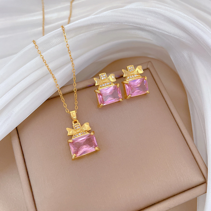 Set collana e orecchini a farfalla con boccetta di profumo_voghion.com
