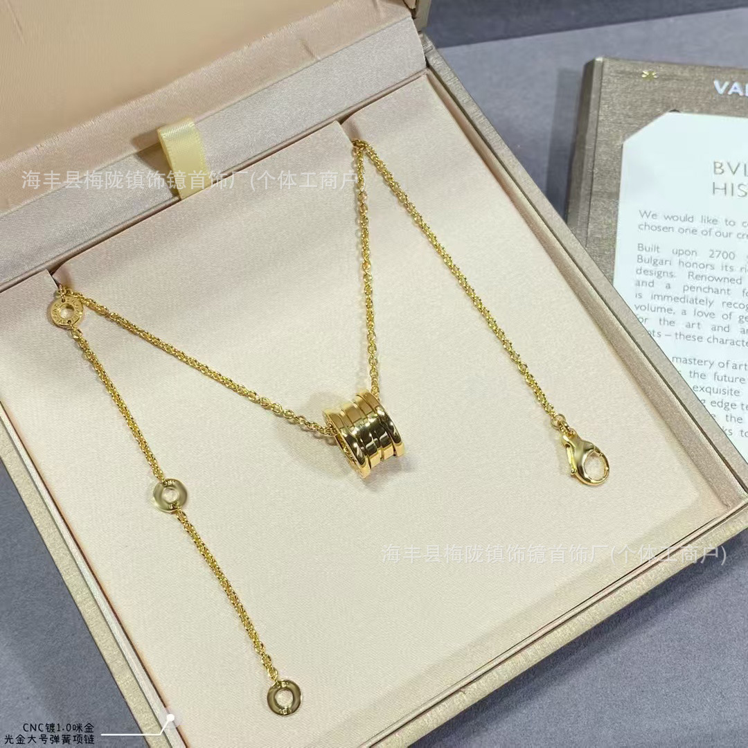Gold spring necklace / A