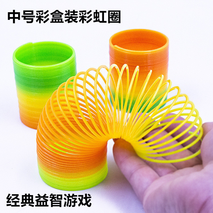 Slinky, colorful small magic hula hoop, plastic flashlight