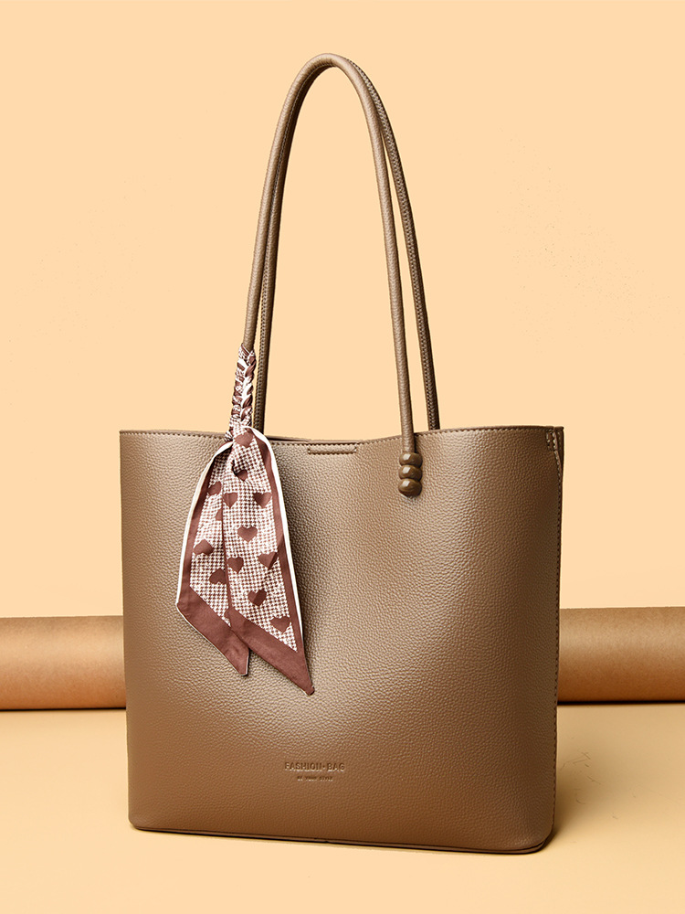 2025 nuevo bolso de mujer bolso de brazo coreano bolso especial bolso de color sólido bolso simple bolso de hombro bolso de viaje universal