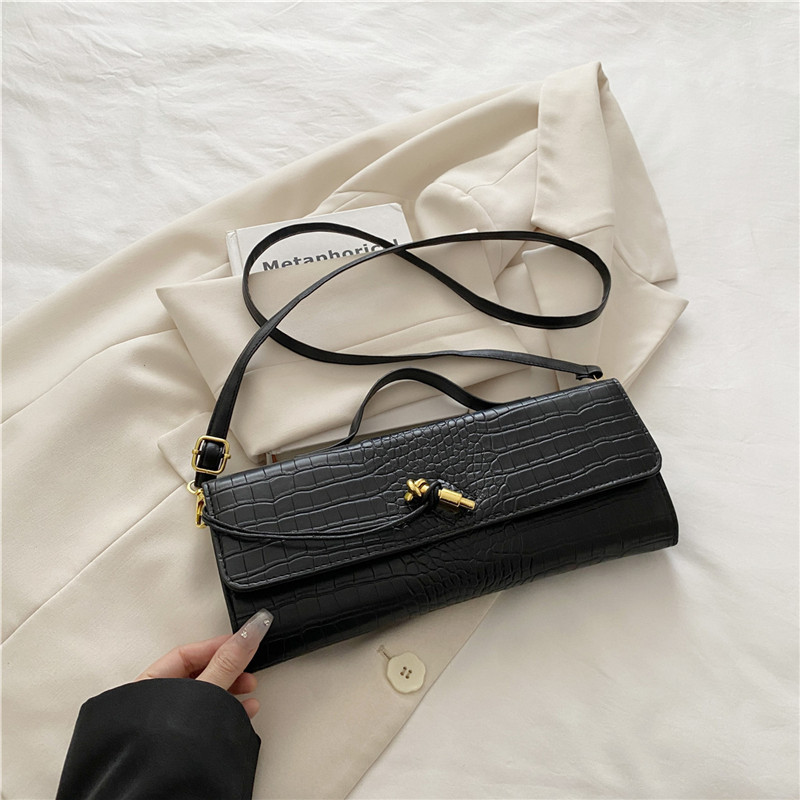 2025 verano temperamento tendencia nuevo temperamento bolso de palo francés con bloqueo diagonal bolso horizontal bolso de mensajero de un solo hombro bolso femenino