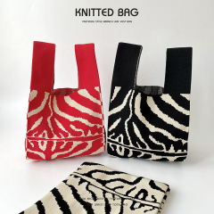 Cross-border new Korean-Japanese minority black and white zebra print knitted single-shoulder hand-held bag, personalized versatile large capacity tote bag