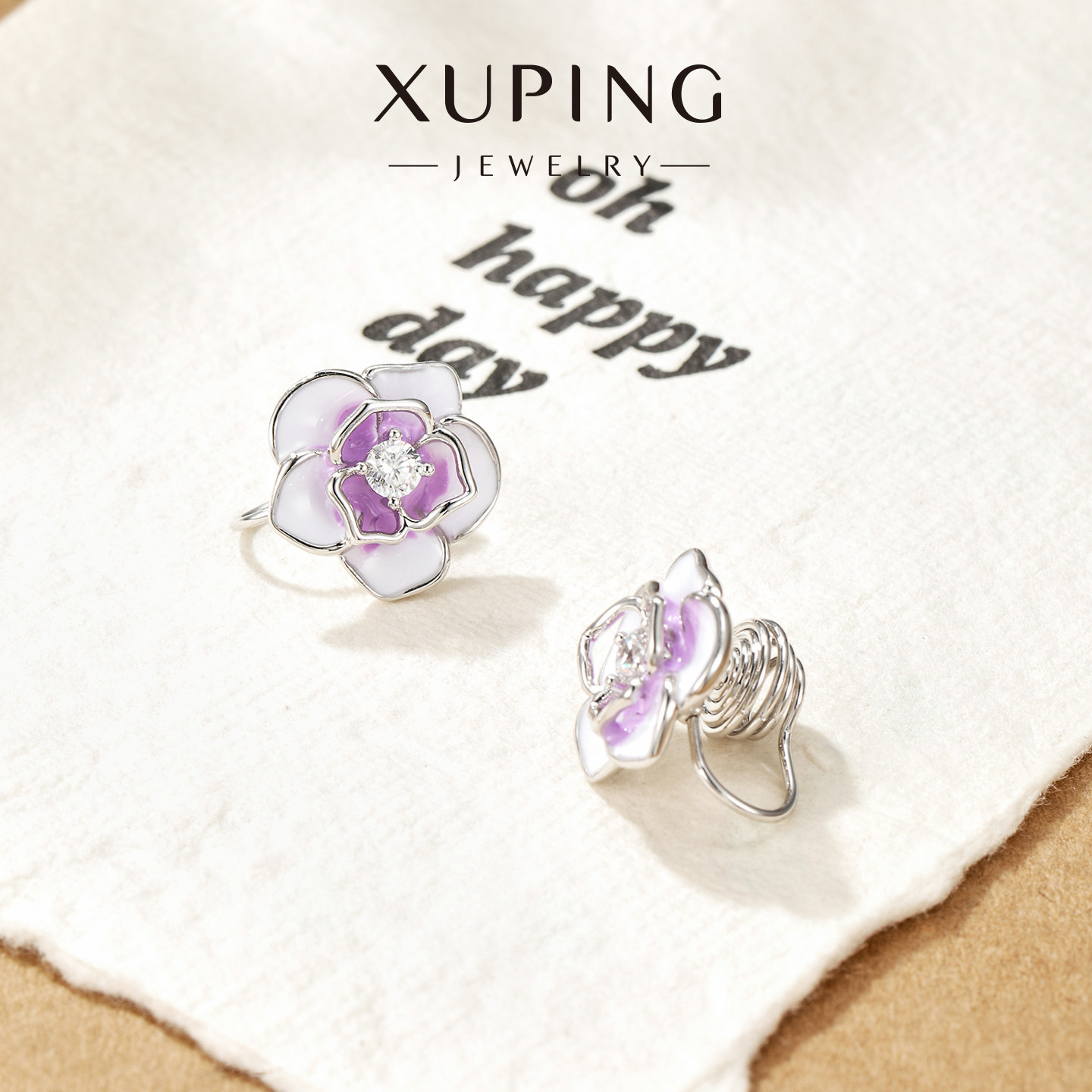 Pendientes de clip Xuping de aleación de cobre con baño de plata, diseño elegante y exclusivo, aretes graciosos y dinámicos para mujeres sin perforaciones en las orejas.