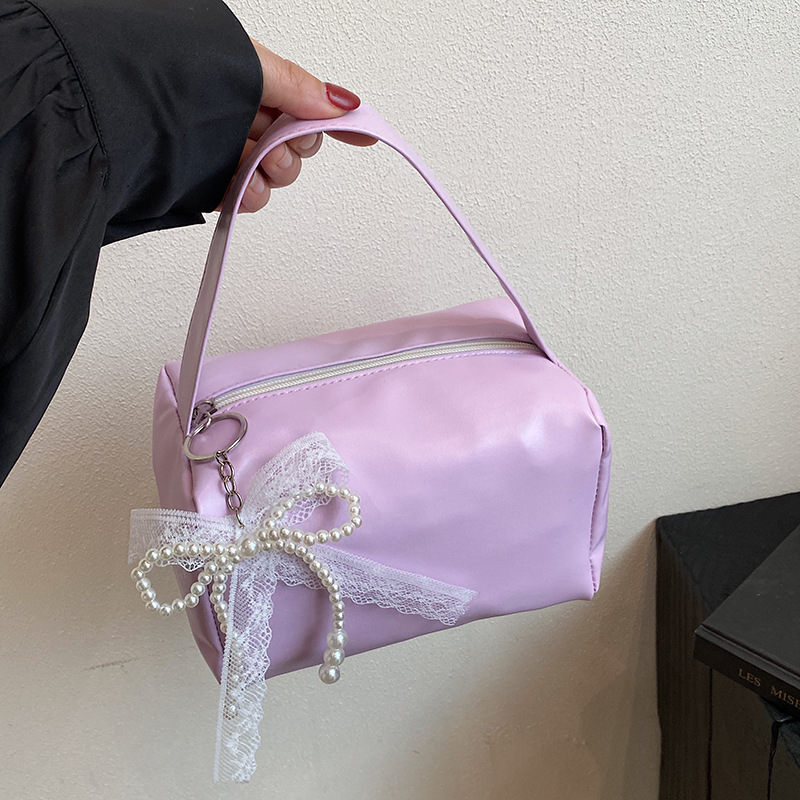Bolsas de brazo populares de este año, bolsas de moda de moda coreana, bolsas pequeñas de primavera y verano 2025, bolsas de mujer casuales de nicho de moda.