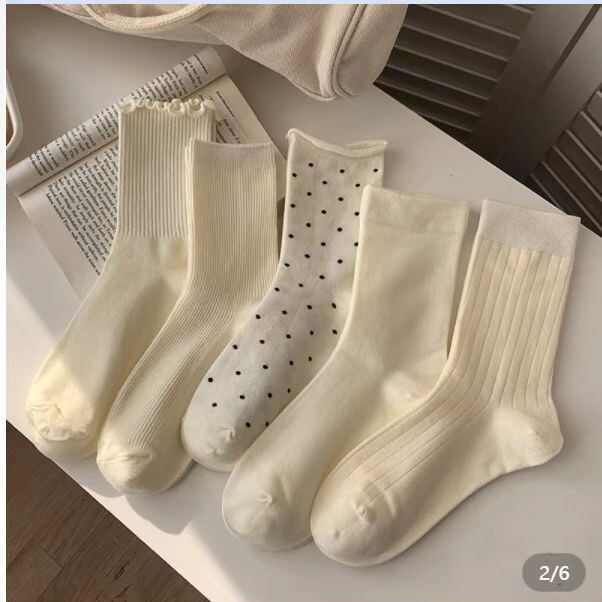 Factory wholesale milk white tube socks spring and summer Joker solid color pile stockings Korean wave point wooden ear side moon socks