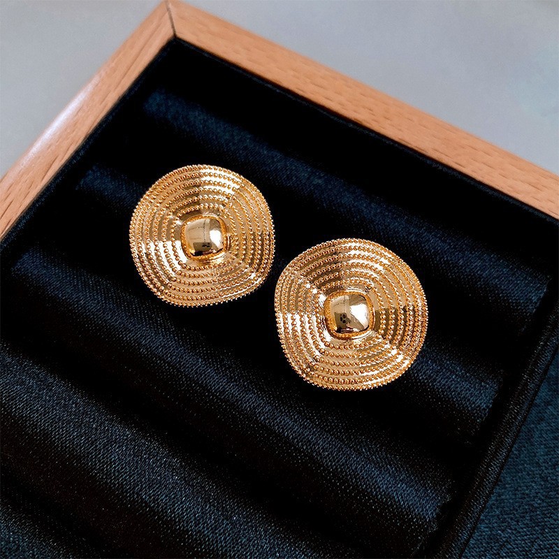 Aguja de plata MEDIADOS DE-antigua flor redonda borla pendientes de metal retro europeo y americano elegante luz pendientes de lujo al por mayor para las mujeres