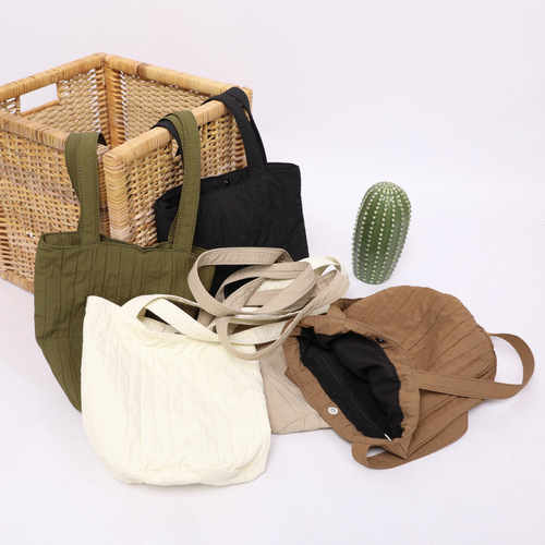 Guangzhou luggage Korean version bucket bag new wrinkle bag ins Korean canvas shoulder bag female armpit bag cross-border