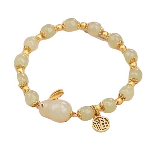 New style national trend and Hetian jade Fu fortune rabbit bracelet for girls, ancient style zodiac rabbit, popular hand tie with red bean agate.
