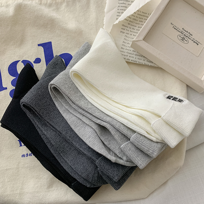 Calcetines de invierno de otoño sólido calcetines de algodón damas AB bordado tendencia vertical calcetines de pila Zhuji calcetines al por mayor