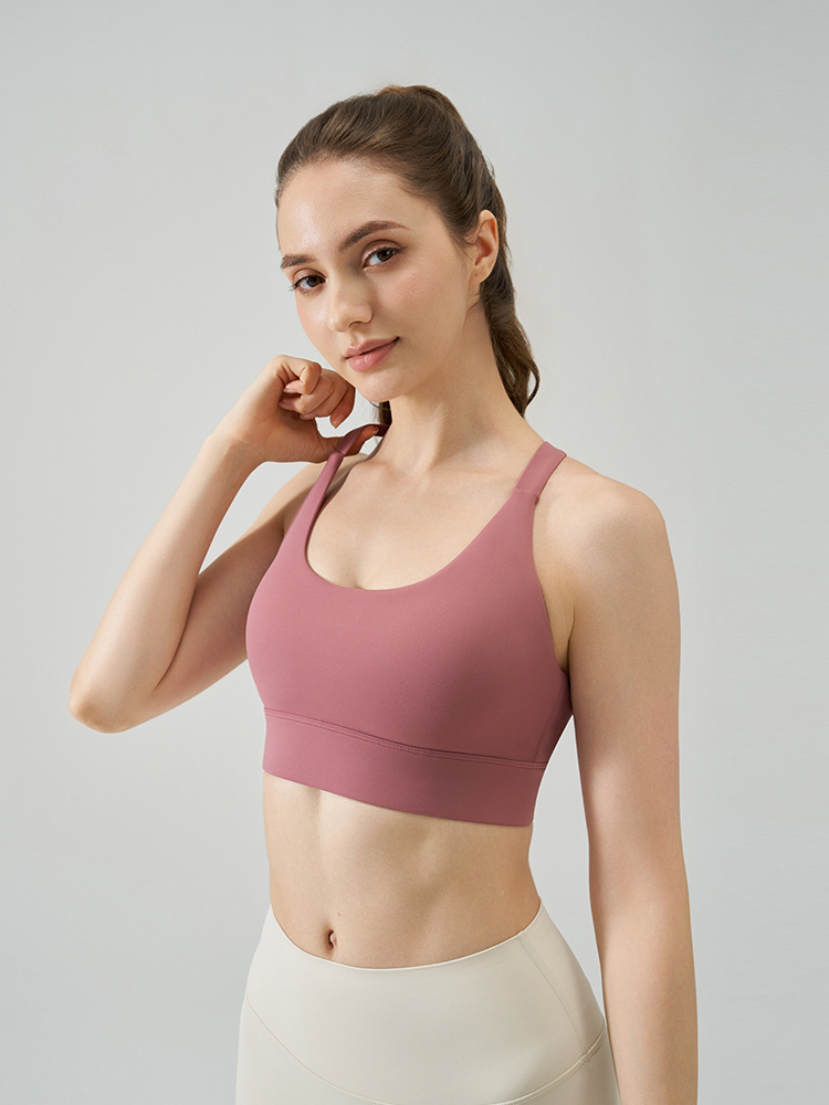 Primavera y verano nuevo estilo desnudo amortiguador sujetador deportivo mujer hueca hebilla hermosa espalda fitness yoga ropa interior correr alta intensidad