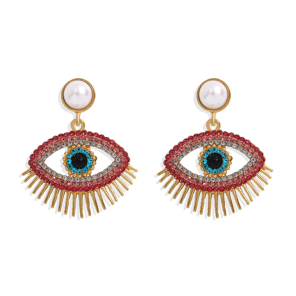 Metal Fashion Pearl Devil Eye Earrings display picture 2