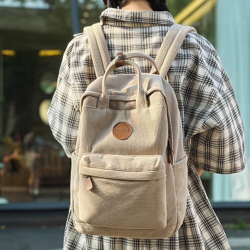 Denim canvas double shoulder bag, vintage style, suitable for students and leisure use.