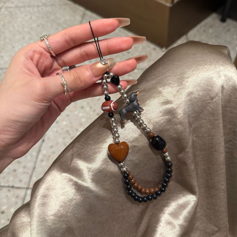 自制橄榄球腊肠狗链条手机壳挂绳串珠diy手机链ccd相机可爱挂饰|undefined