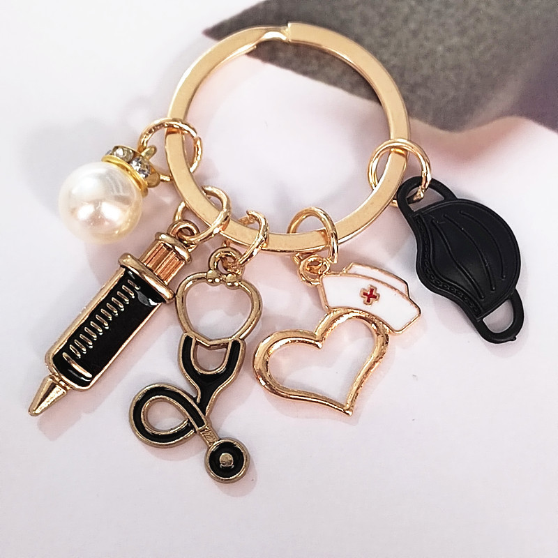 Llavero médico nuevo transfronterizo enfermera doctor jeringa estetoscopio personal