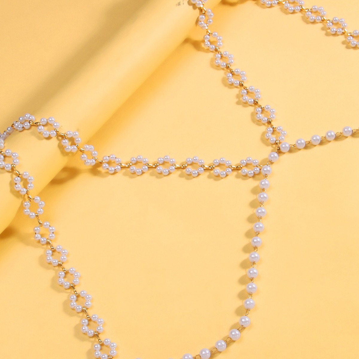 Europa y América nuevas flores de perlas cadena de pecho sexy bikini cuello accesorios cadena de cuerpo