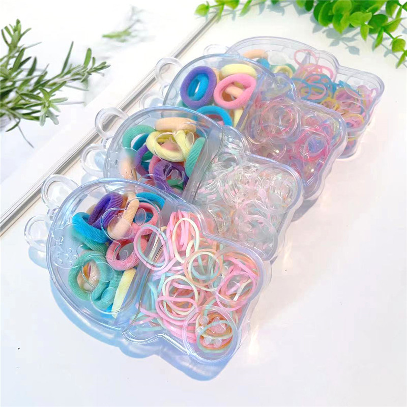 Invierno nuevo color transparente en caja cuerda de pelo accesorios para el cabello dos en uno joyería de las niñas anudadas dos yuanes tienda de tocado al por mayor