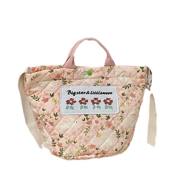 Otoño y invierno nuevo tipo de bolso de hombro para niños y niñas, pequeño bolso de algodón fresco, nuevo tipo de bolso de gran capacidad para niños.