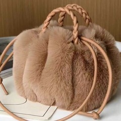 卸売りのぬいぐるみのカバンはウサギの毛のかわいいカボチャのカバンに似ています。