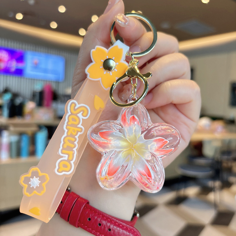 クリエイティブオイル入りプルメリアキーホルダー花液体流砂小さなペンダントバッグアクセサリーカップル小さなギフト|undefined