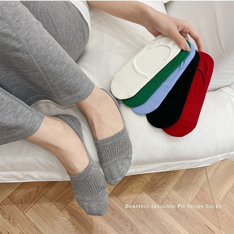 2025 primavera y verano delgada boca ligera de color sólido simple algodón peinado sin costura base de calcetines de barco invisible mujer no caiga talón