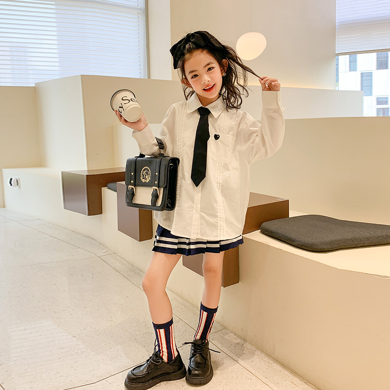 Ropa para niños primavera 2023 nueva camisa de manga larga estilo universitario para niñas estilo coreano camisa de solapa de estilo occidental para niños medianos y grandes