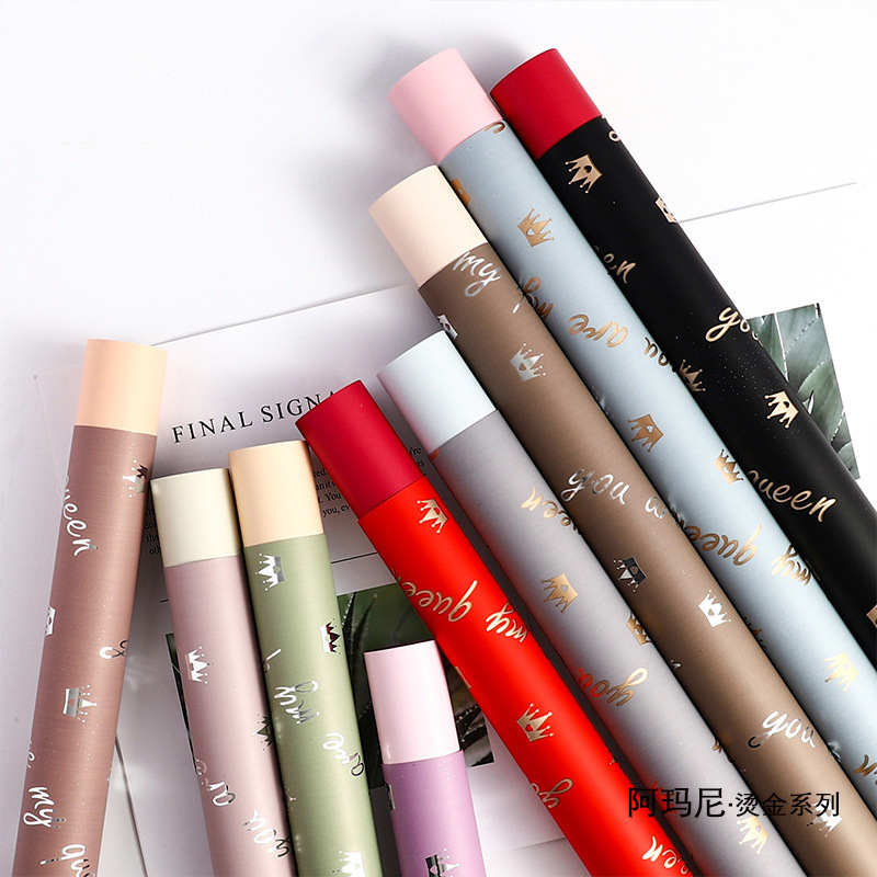 跨境包装纸优惠批发防水花艺包花纸材料英文皇冠欧雅花束包装纸