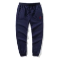 Navy blue pants with red label