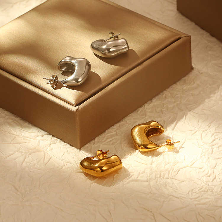 Ins Pendientes de acero inoxidable irregulares lisos transfronterizos europeos y americanos Pendientes irregulares de todo fósforo para damas de alta gama retro