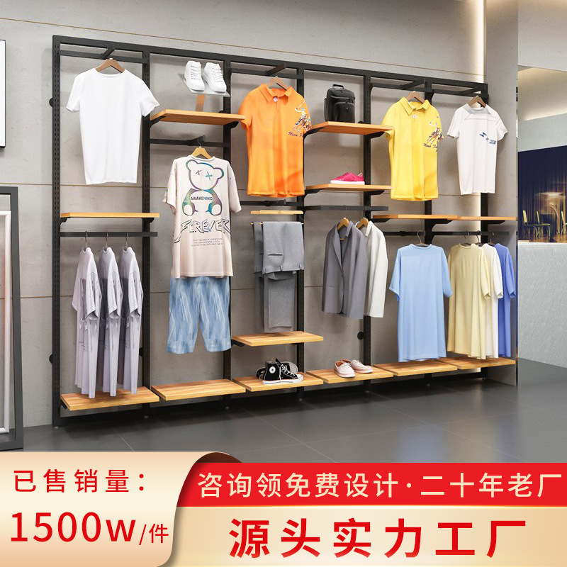 Tienda de ropa deportiva soporte de exhibición piso estante para hombres centro comercial estante de ropa casual de gama alta pared tienda de ropa para hombres