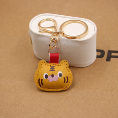 Cute little lucky tiger leather boutique gold keychain pendant Year of the Tiger bag accessories pendant can be customized