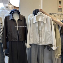 経典版の韓国のchi秋の復古的な襟のファスナーの百合の機関車の服のpuは皮の服のショートコートの婦人服をまねます。