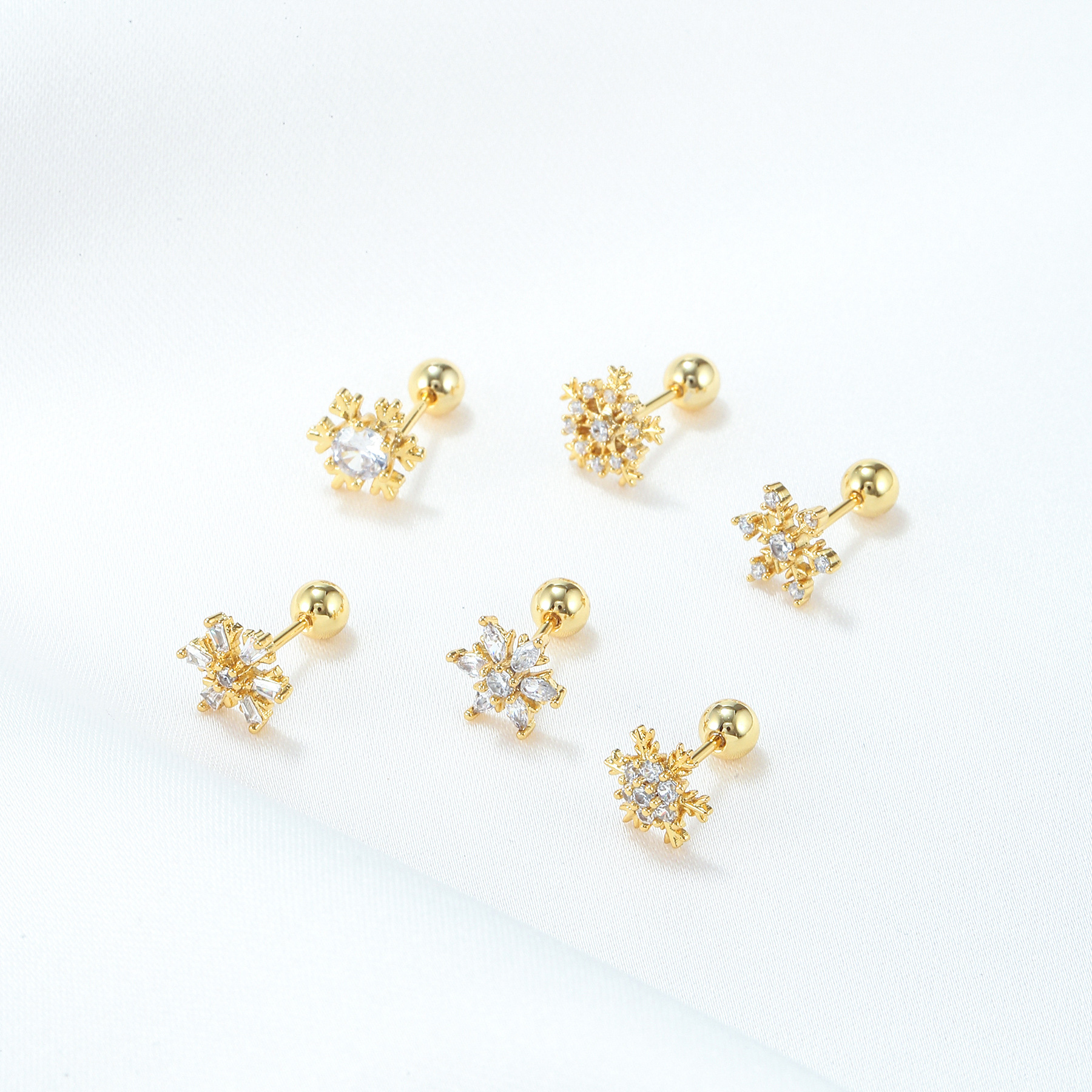 Korean White Snowflake Ear Studs Piercing Screw Ball Copper Ear Studs display picture 3