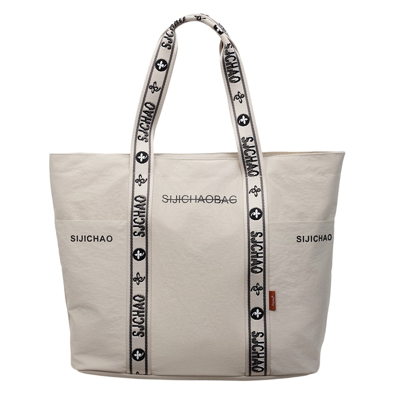 Bolsa de tela de nylon de gran capacidad para mujeres bolsas de impresión de letras de la ciudad simple viaje bolso de hombro bolso de mano ocio