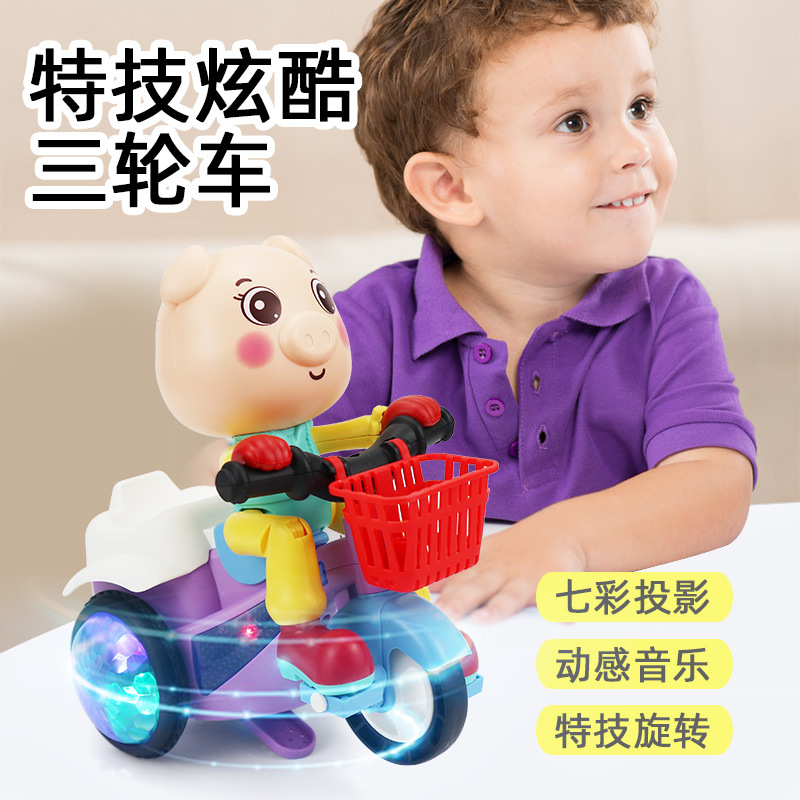 TikTok con música genial magnífico truco ligero giratorio pequeño Triciclo de cerdo lindo puesto de coche de juguete eléctrico para niños