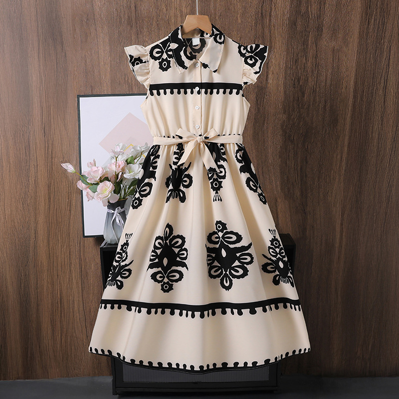 Vestidos de niñas vestidos de comercio exterior ropa infantil en verano, Europa y los Estados Unidos nuevos estampados de moda transfronterizos mangas voladoras para cerrar la cintura falda de camisa elegante